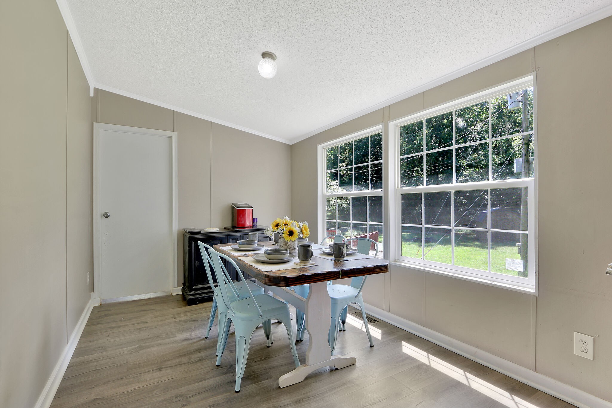 2218 Lee Road Spring Hill, TN 37174 - Photo 9 of 19 a dining room with furniture and a floor to ceiling window