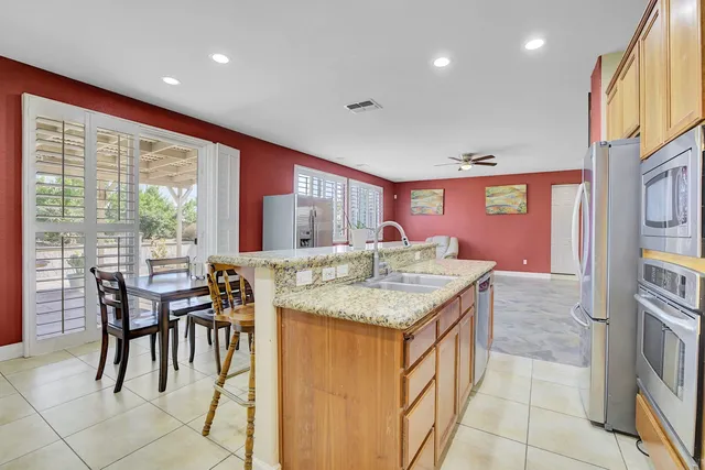 a bedroom with a bed and a table