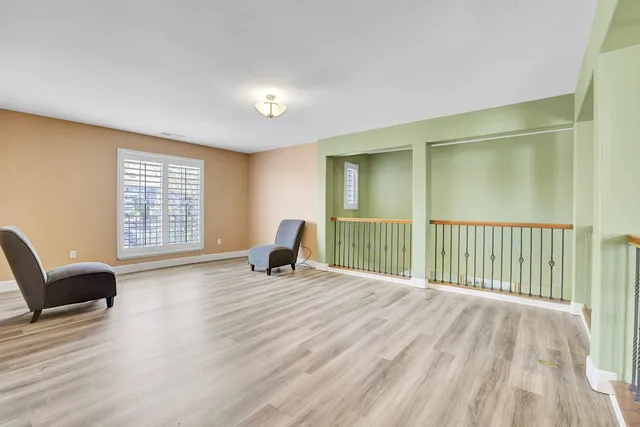 a bathroom with a shower and a sink