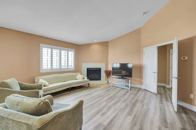 a bedroom with a bed and a table