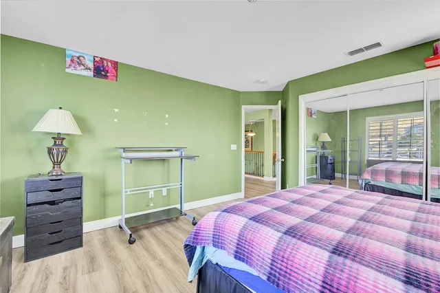 a view of a porch with chairs and backyard