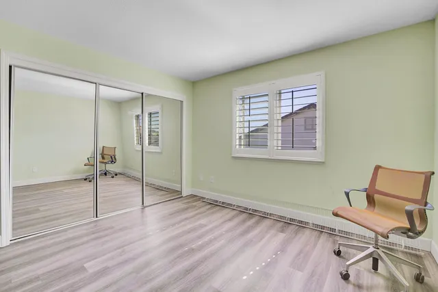 a view of a garden with patio