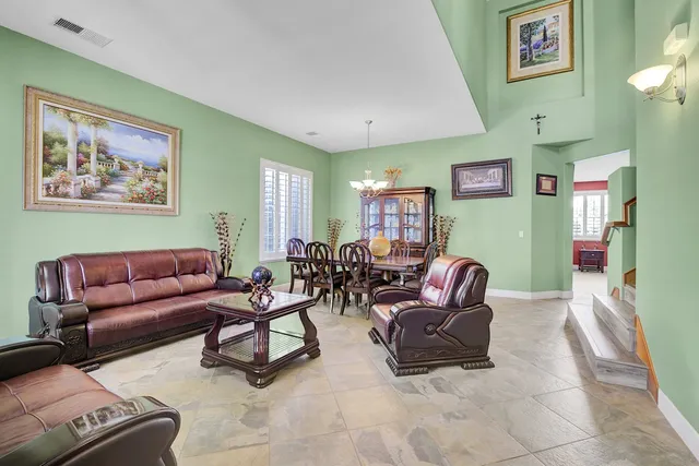 a view of a livingroom with furniture window and outside view