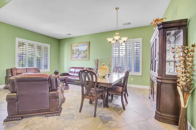 a kitchen with sink cabinets and window