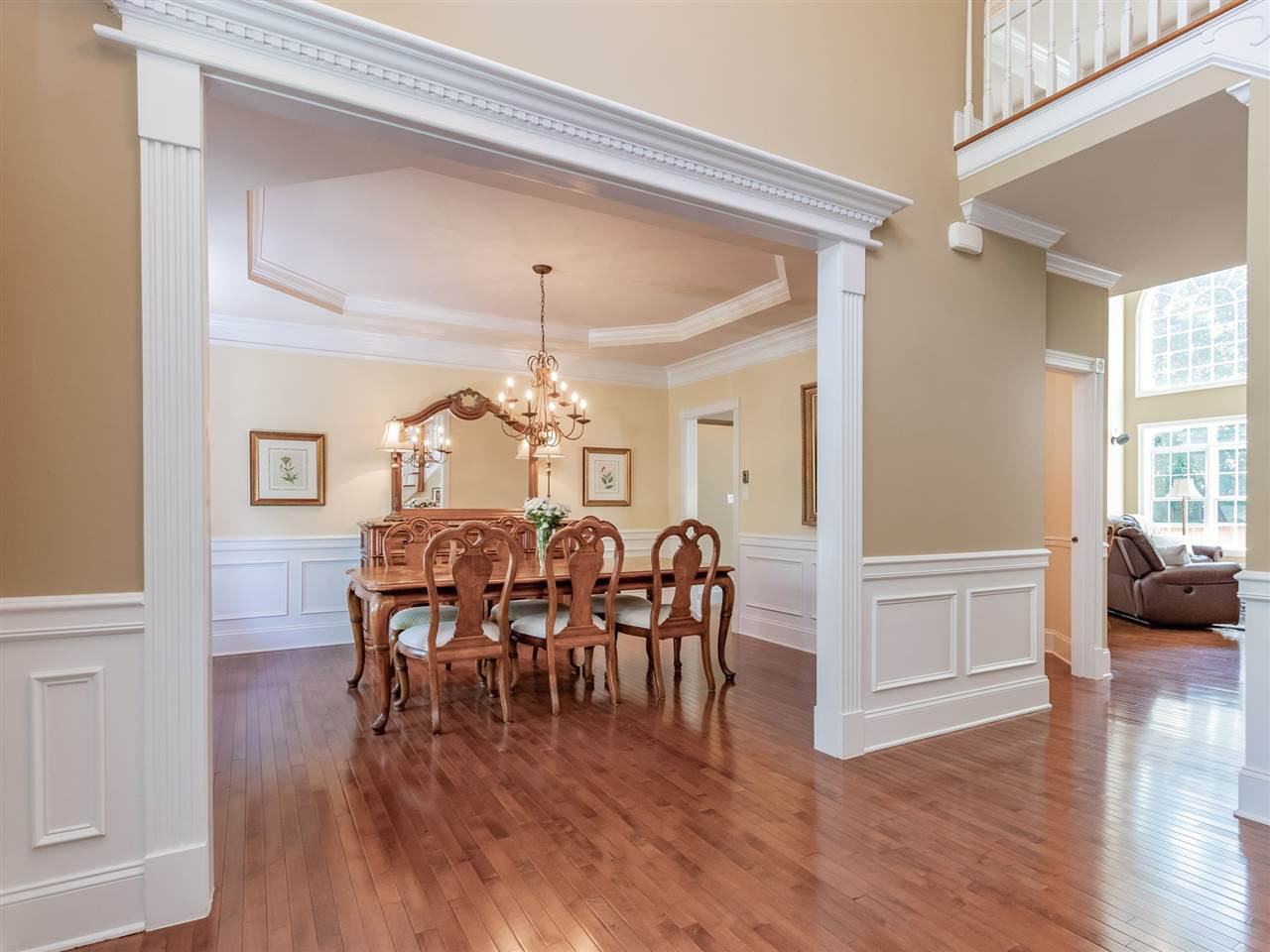 4717 Haleytree Court Raleigh, NC 27606 - Photo 5 of 30 Very spacious dining room has a beautiful tray ceiling, hardwoods, and can fit a large table for family gatherings! Dining Room