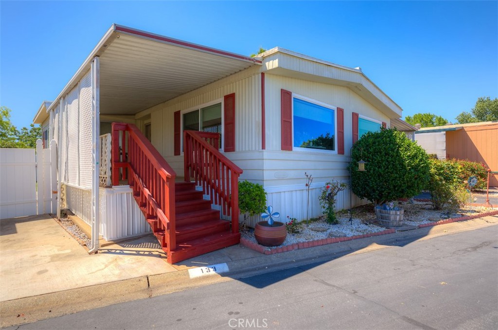1901 Dayton Road, Unit 133 Chico, CA 95928 - Photo 1 of 36 a front view of a house with entryway