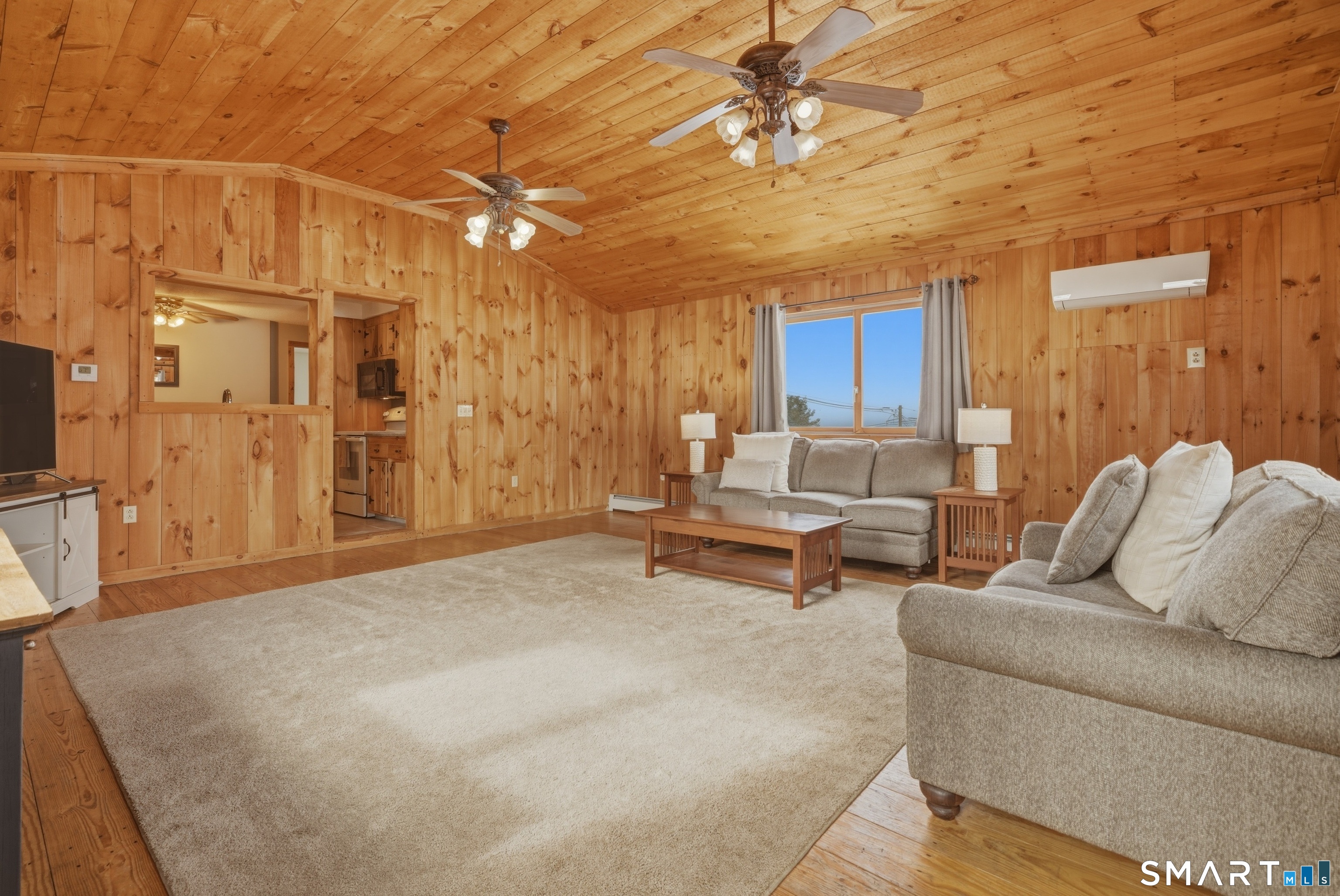 9 Morrison Street, Unit 1 Vernon, CT 06066 - Photo 1 of 1 a living room with furniture and a chandelier