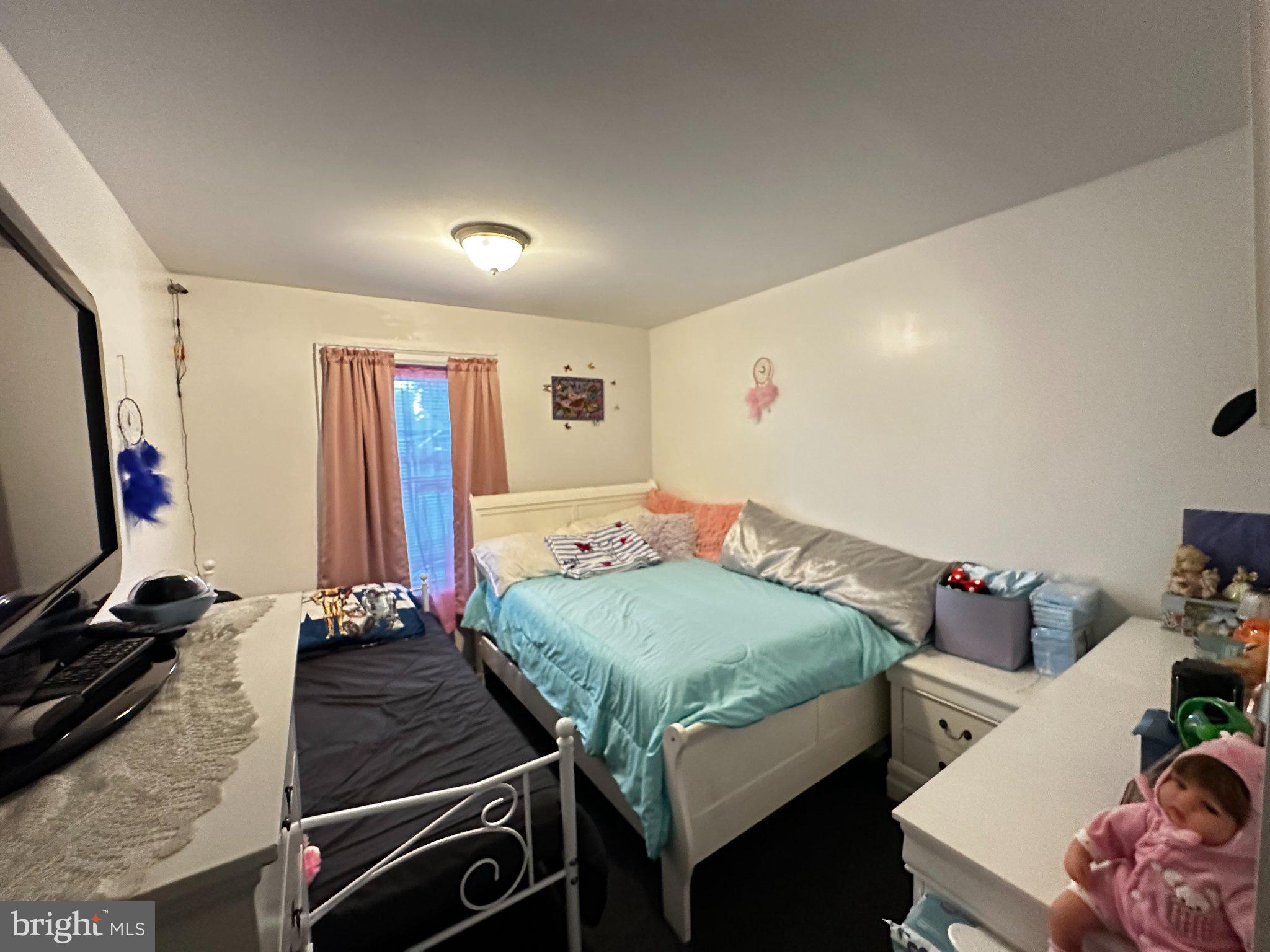 3049 Porter Road Camden, NJ 08104 - Photo 10 of 17 Cozy bedroom with soft pastel hues.