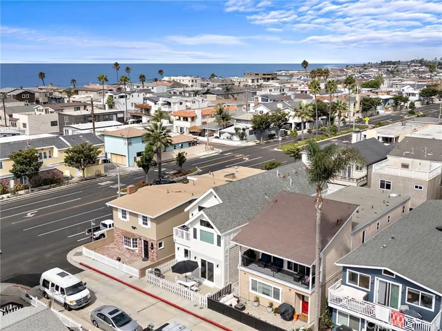 an aerial view of a house with outdoor space