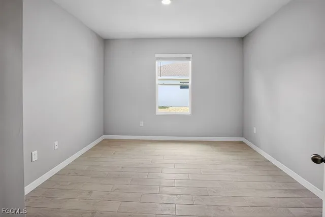 an empty room with a window