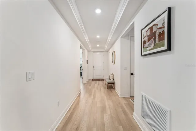a view of entryway with wooden floor