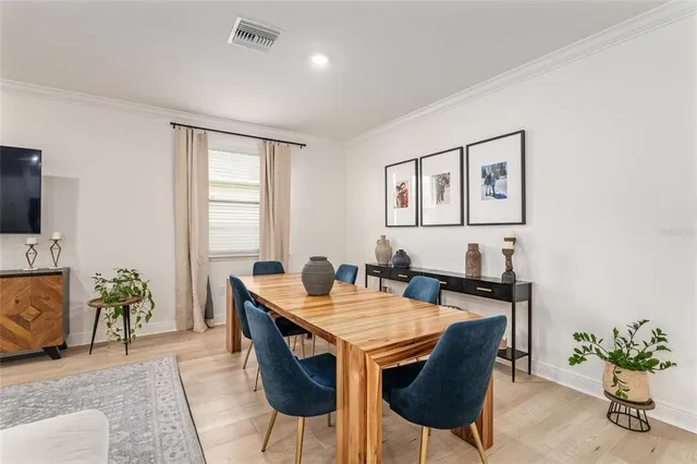 a view of a dining room with furniture