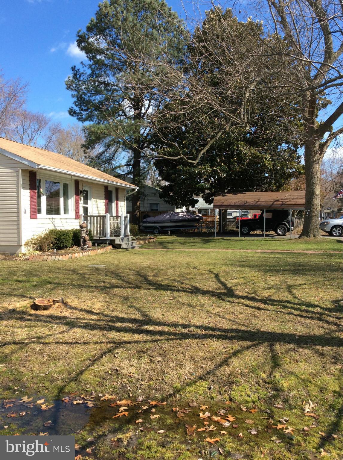 704 Kingfisher Road Deale, MD 20751 - Photo 3 of 27 a view of a house with a yard