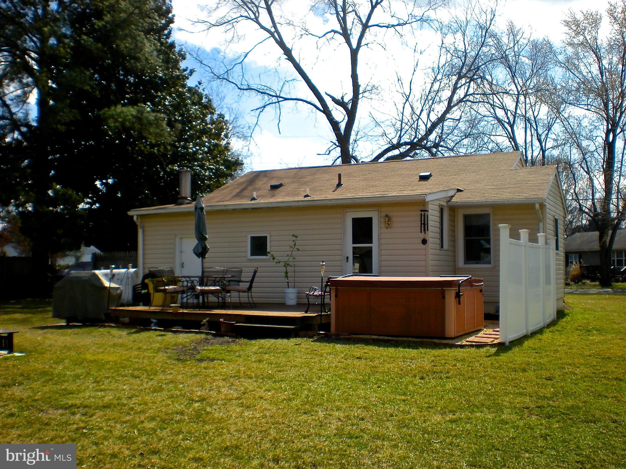 704 Kingfisher Road Deale, MD 20751 - Photo 22 of 27 a view of a house with back yard