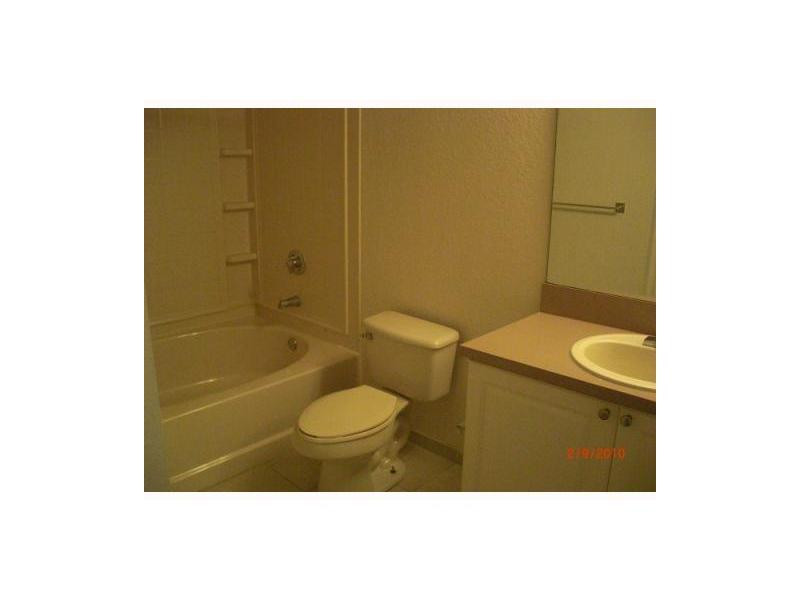 6908 West Sample Road, Unit B32 Pompano Beach, FL 33063 - Photo 3 of 7 Exterior Front