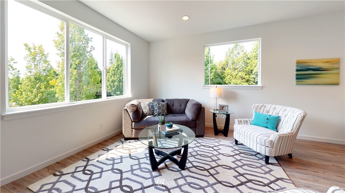 345 South 48th Court, Unit 9 Renton, WA 98055 - Photo 13 of 26 a living room with furniture and a window