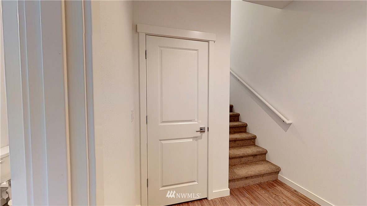 345 South 48th Court, Unit 9 Renton, WA 98055 - Photo 25 of 26 a view of entryway with wooden floor