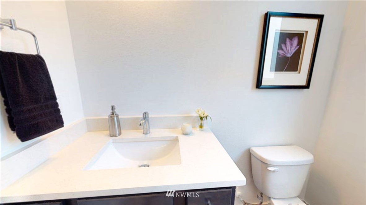 345 South 48th Court, Unit 9 Renton, WA 98055 - Photo 5 of 26 a bathroom with a toilet and a sink