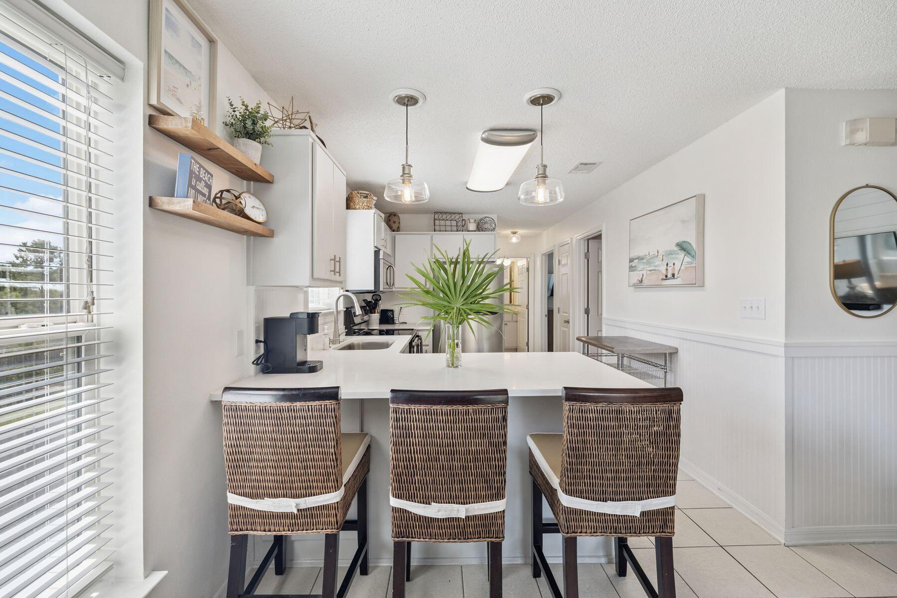 82 Sugar Sand Lane, Unit B4 Santa Rosa Beach, FL 32459 - Photo 8 of 25 Kitchen with Bar Seating