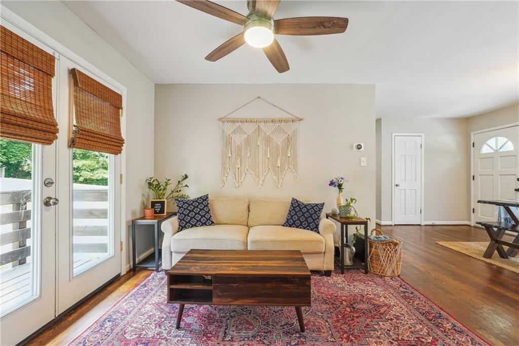 3483 Glensford Drive Decatur, GA 30032 - Photo 11 of 24 a living room with furniture and a large window
