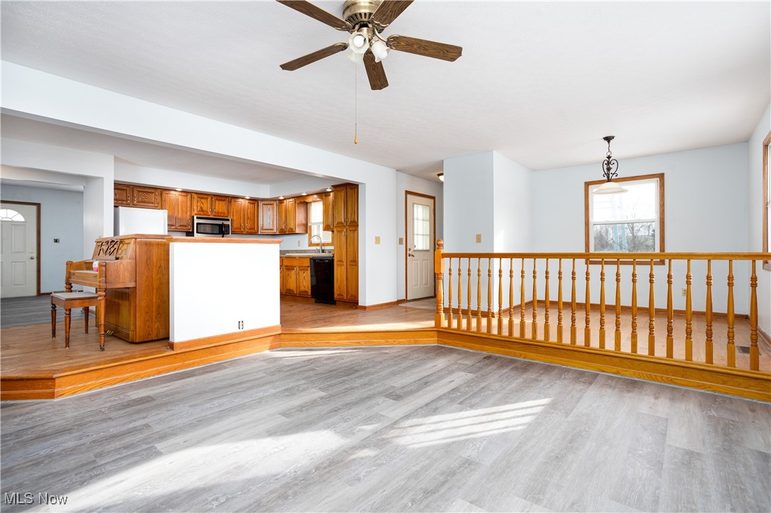 4254 Beat Road Litchfield, OH 44253 - Photo 8 of 27 One step Down to New Engineered Vinyl, Fan