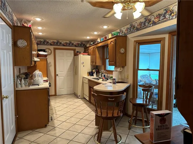 $325,000 | 99 Hawthorne Hill Drive, Warrensburg, MO 64093