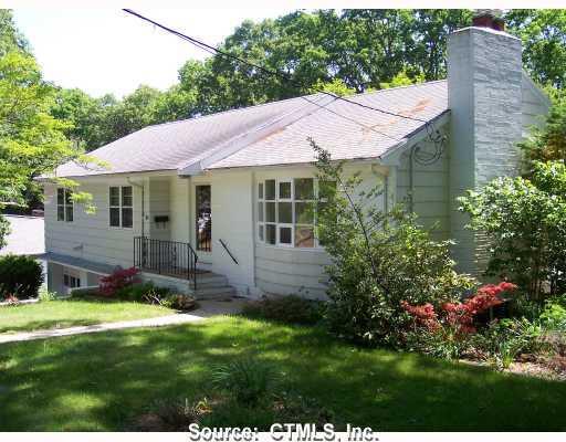 Exterior Front. Charming mid-century ranch in lovely, quiet neighborhood. Lots to work with to make it your dream home!