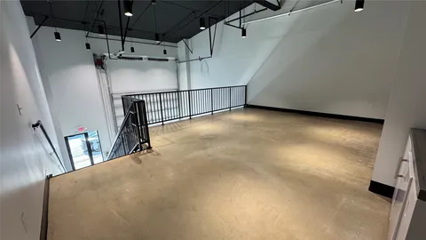 a view of water heater room with stairs