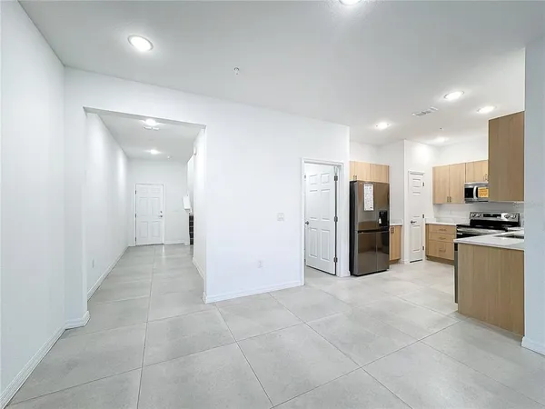 a bathroom with a shower a toilet and a sink