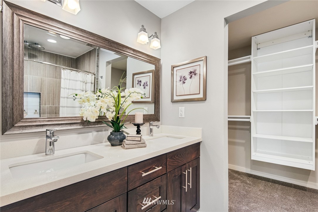 3617 Geyer Lane Everett, WA 98203 - Photo 12 of 23 a bathroom with a sink double vanity and a mirror