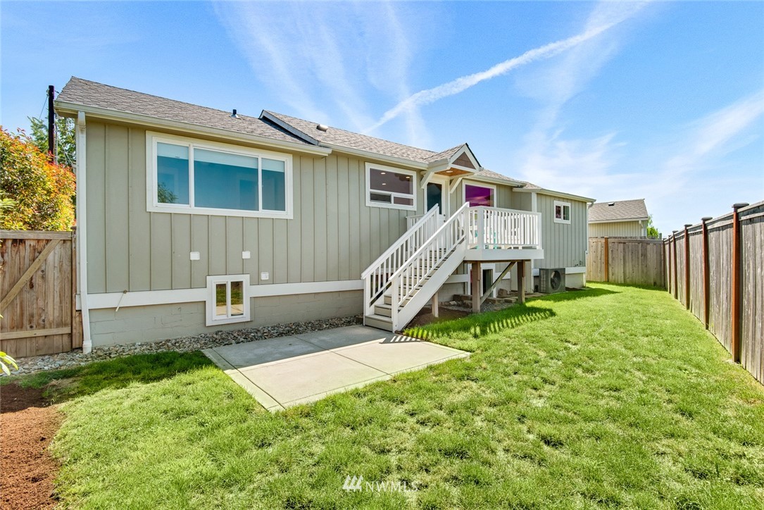 3617 Geyer Lane Everett, WA 98203 - Photo 21 of 23 a view of a house with a yard and sitting area