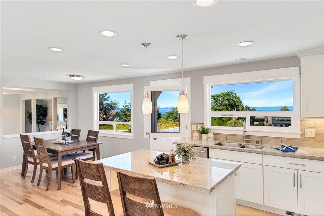 3617 Geyer Lane Everett, WA 98203 - Photo 5 of 23 a kitchen with a dining table chairs and window
