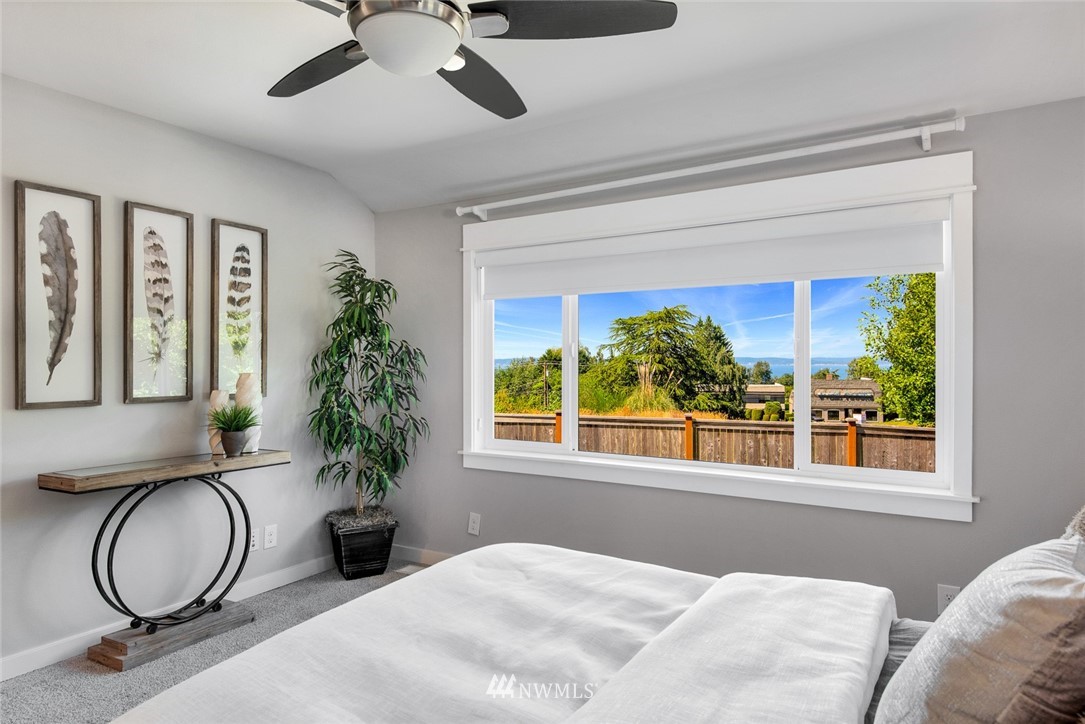 3617 Geyer Lane Everett, WA 98203 - Photo 10 of 23 a bedroom with a large bed and a large window