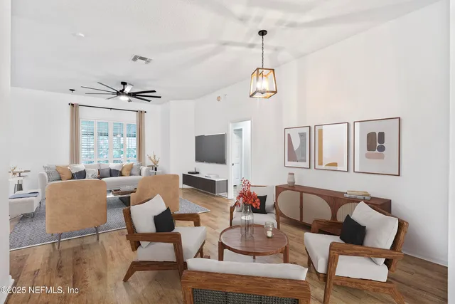 a view of a dining room with furniture