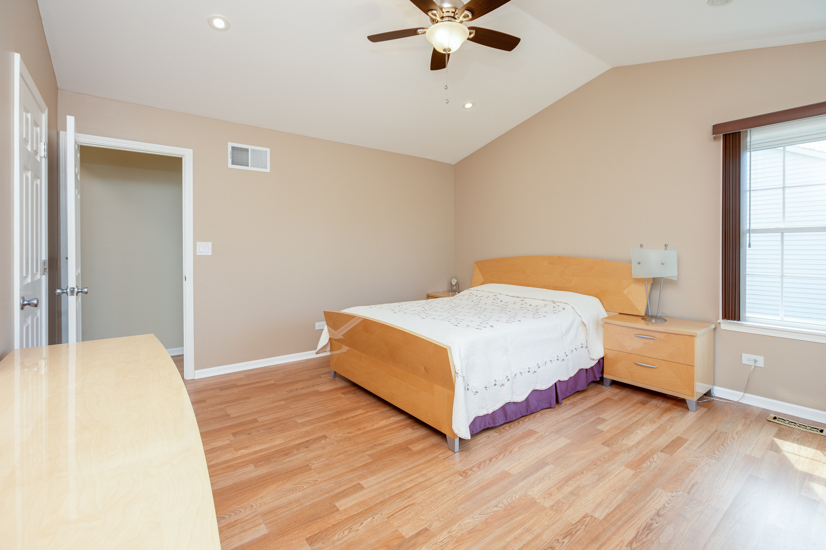 718 Huntington Drive Carol Stream, IL 60188 - Photo 13 of 28 a bedroom with a bed and window