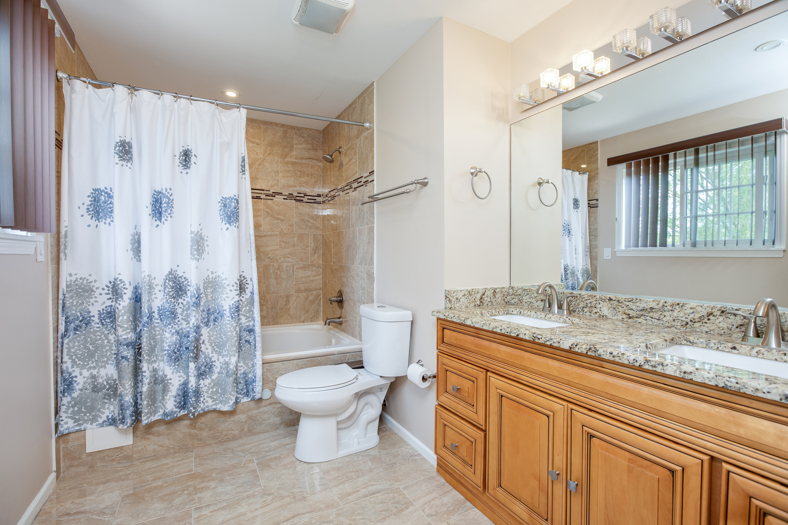 718 Huntington Drive Carol Stream, IL 60188 - Photo 14 of 28 a bathroom with a granite countertop sink toilet and shower