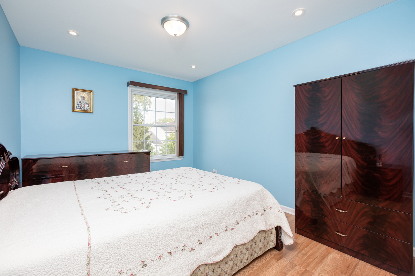 718 Huntington Drive Carol Stream, IL 60188 - Photo 16 of 28 a bedroom with a bed and a window