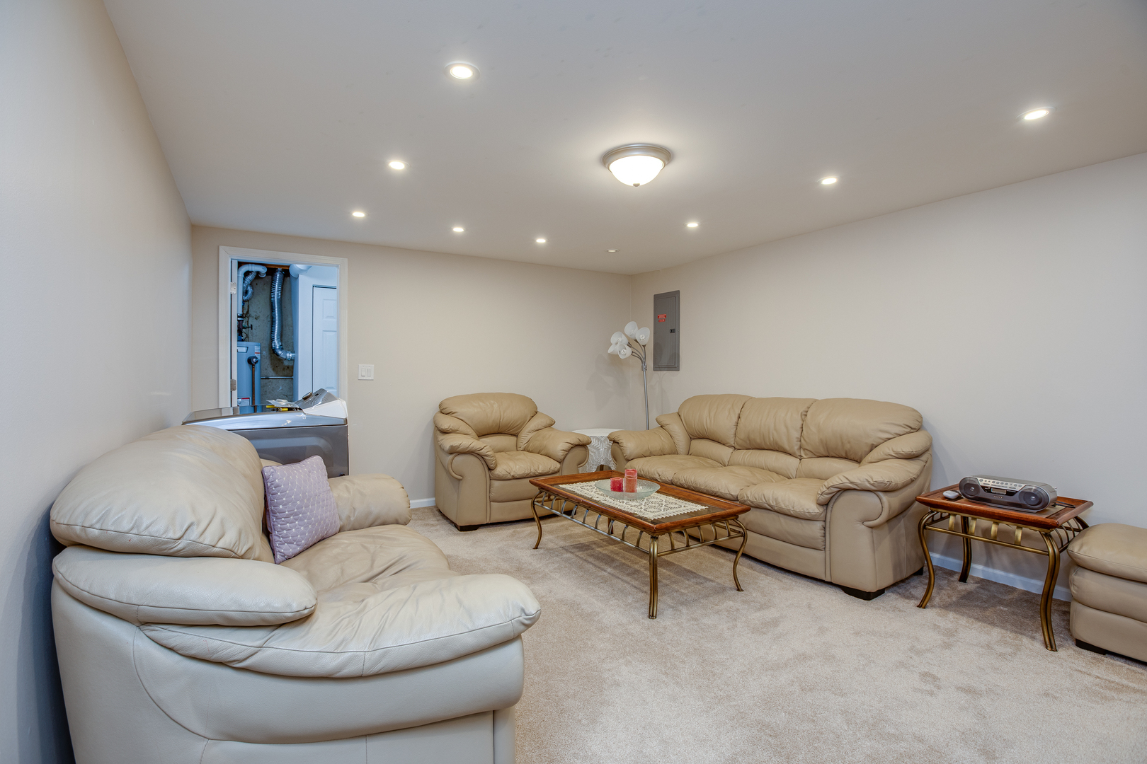 718 Huntington Drive Carol Stream, IL 60188 - Photo 20 of 28 a living room with furniture and a large window