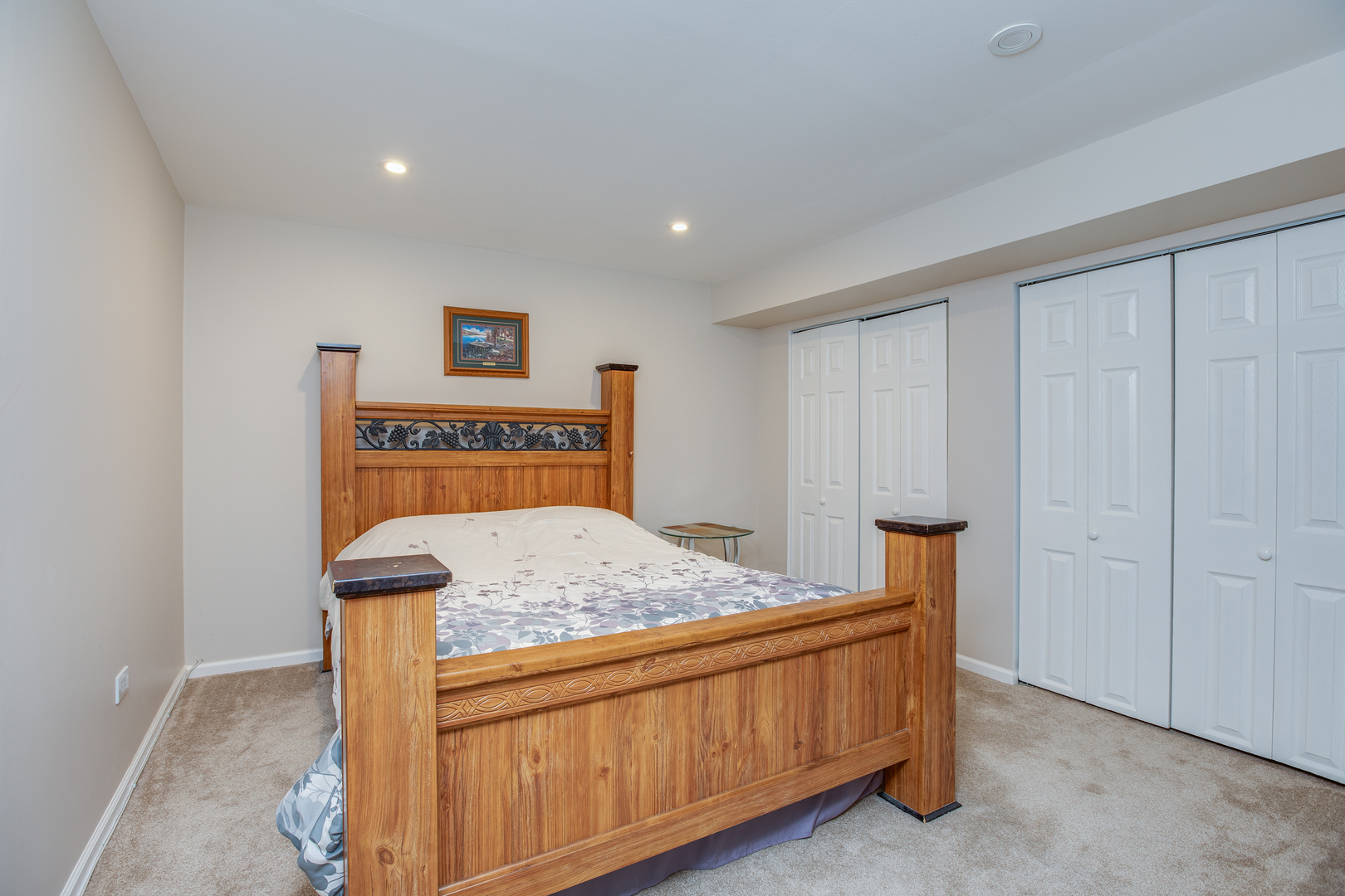 718 Huntington Drive Carol Stream, IL 60188 - Photo 23 of 28 a bedroom with a bed and a dresser