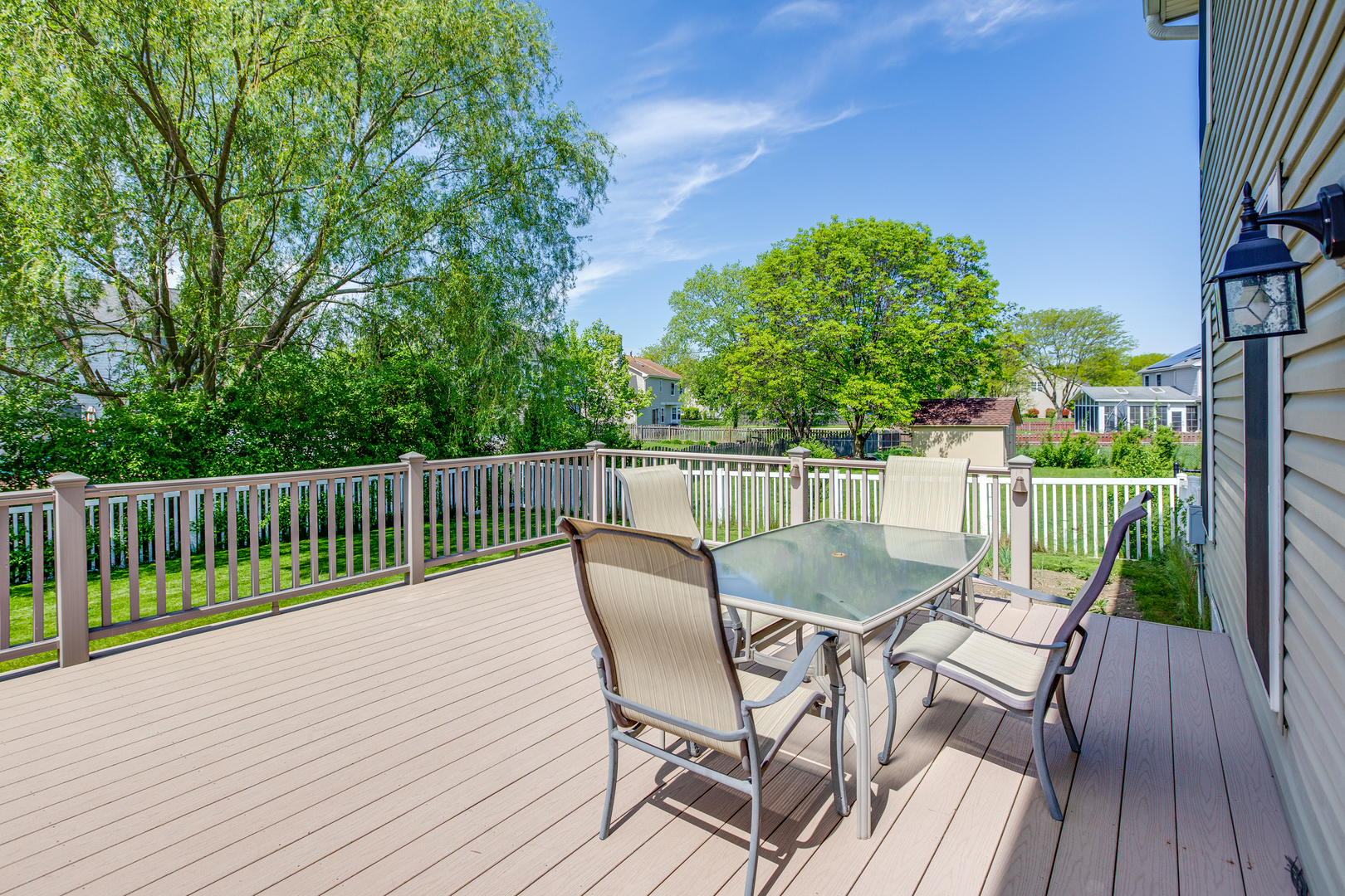 718 Huntington Drive Carol Stream, IL 60188 - Photo 27 of 28 a view of a chairs and table on the wooden floor