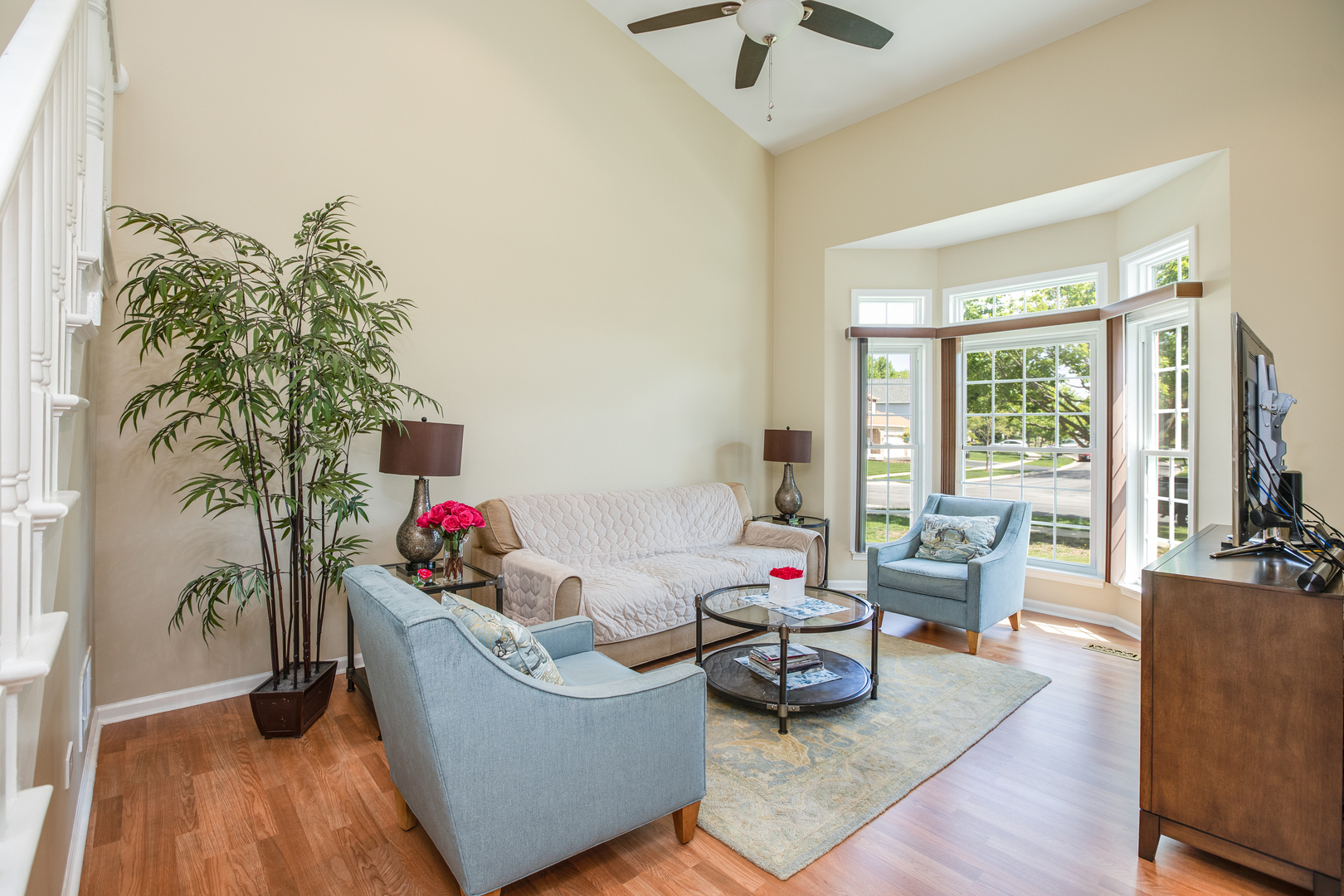 718 Huntington Drive Carol Stream, IL 60188 - Photo 3 of 28 a living room with furniture and a large window