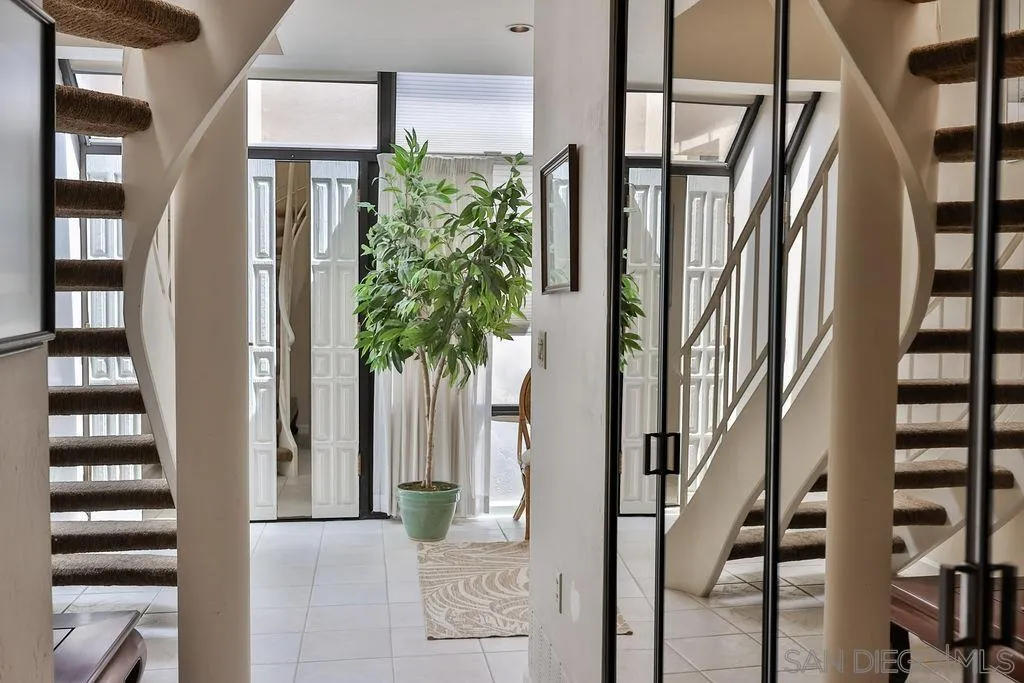 835 D Avenue, Unit 4 Coronado, CA 92118 - Photo 18 of 35 a view of staircase with lots of green walls
