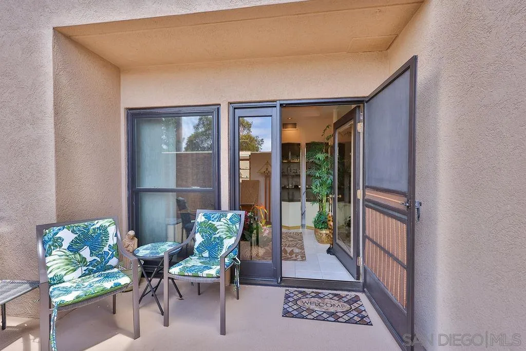 835 D Avenue, Unit 4 Coronado, CA 92118 - Photo 3 of 35 a balcony with furniture and a potted plant
