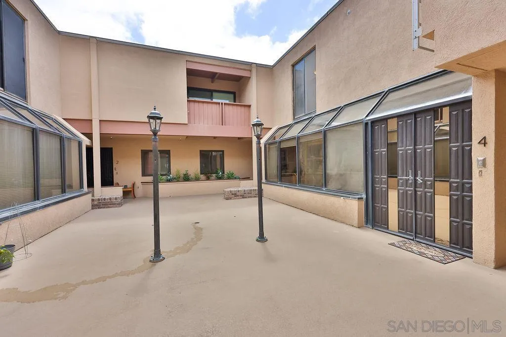 835 D Avenue, Unit 4 Coronado, CA 92118 - Photo 31 of 35 a view of a house with a street