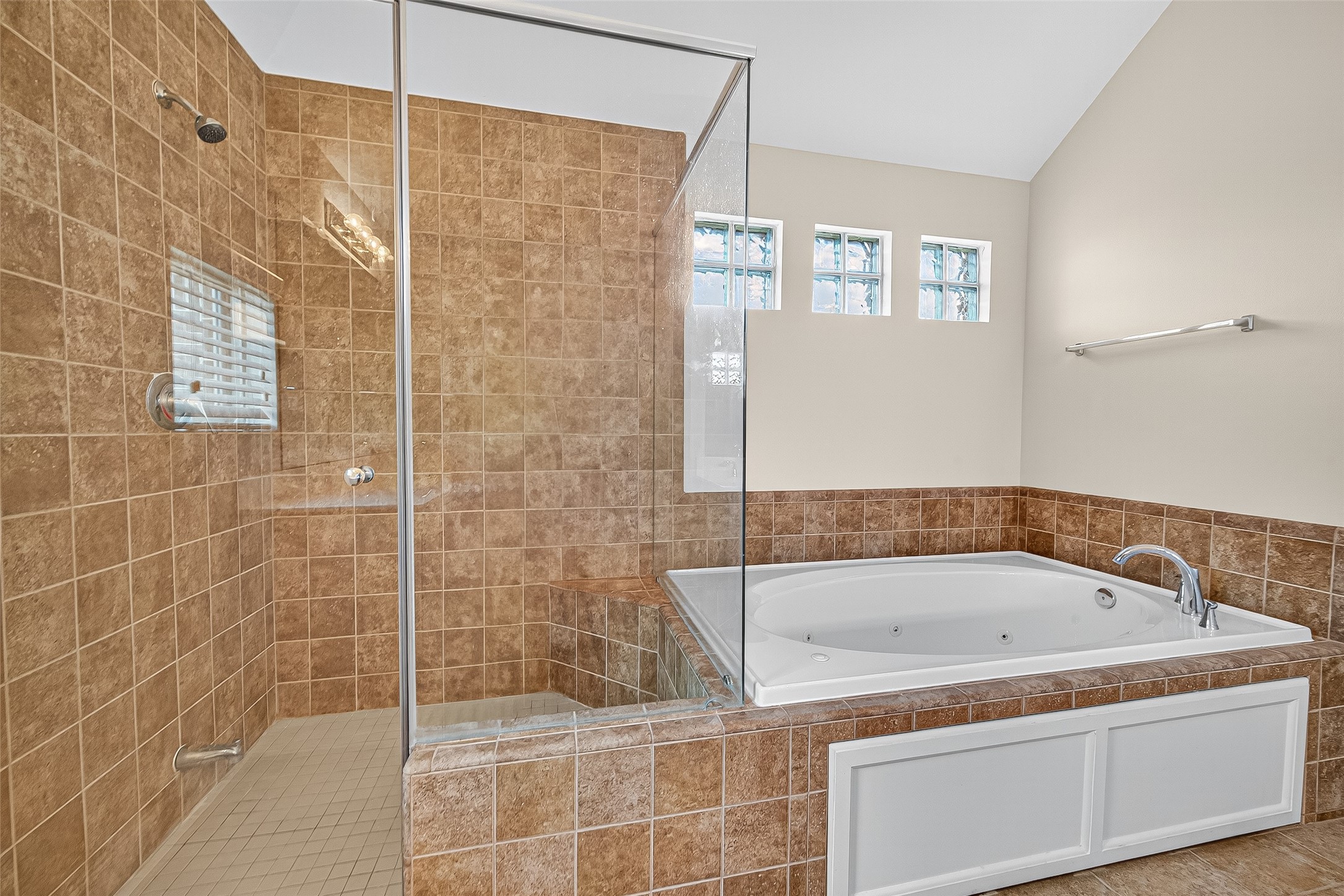 11510 Main Ash Drive Houston, TX 77025 - Photo 37 of 39 a bathroom with a bathtub and shower