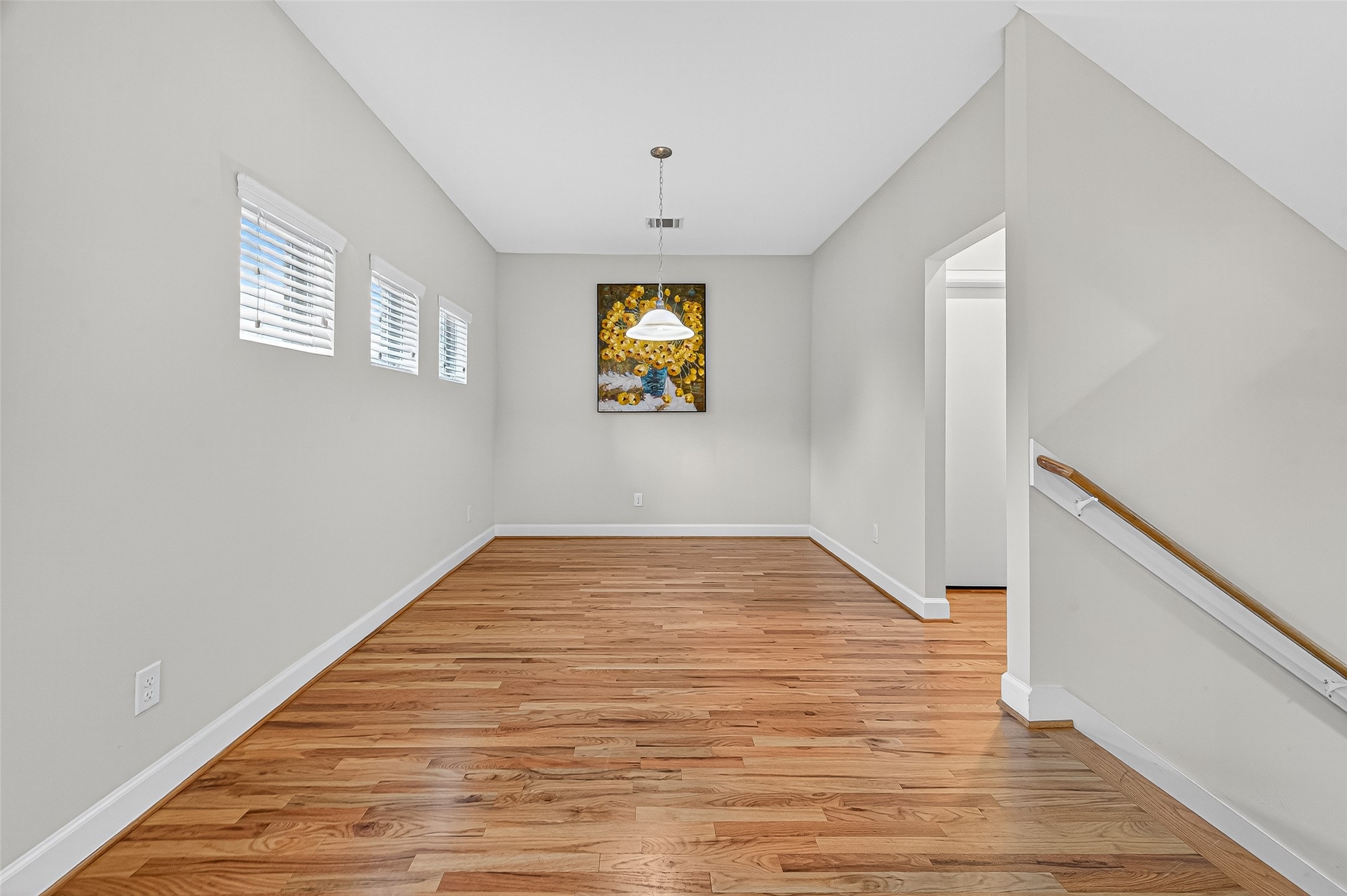 11510 Main Ash Drive Houston, TX 77025 - Photo 6 of 39 a view of empty room with wooden floor and fan