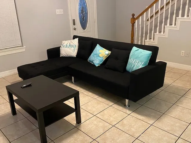 a living room with couches and furniture