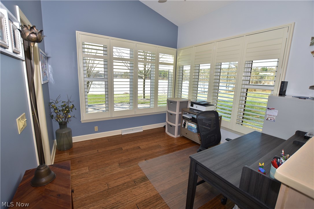 1251 Arrowhead Drive Southwest Dellroy, OH 44620 - Photo 25 of 50 This home office area is located a couple steps down from the master bedroom area. Enjoy pristine lake views as you work from home.