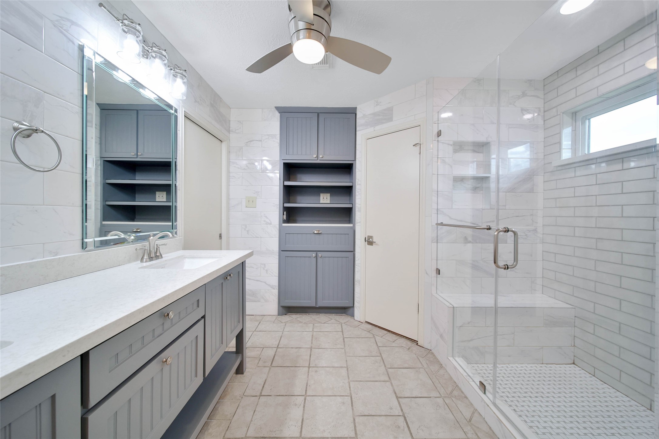 5010 Cupids Bower Court Spring, TX 77388 - Photo 18 of 40 a bathroom with a sink a toilet a mirror and shower