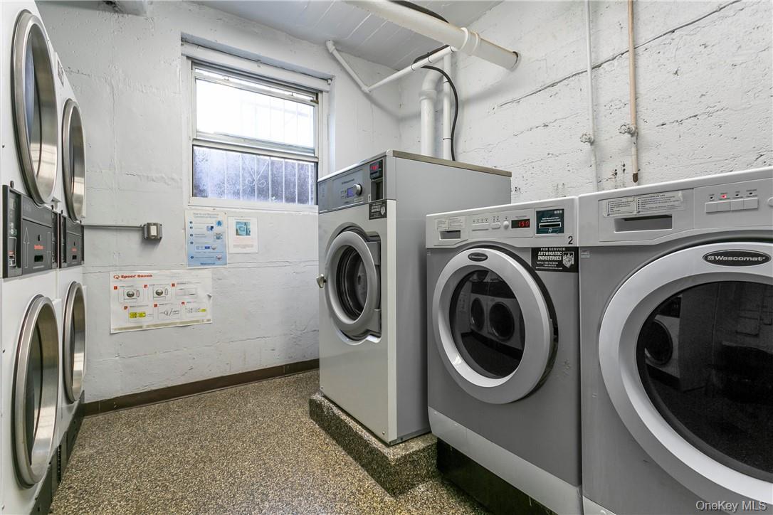 485 Bronx River Road, Unit A50 Yonkers, NY 10704 - Photo 21 of 23 a utility room with dryer and washer